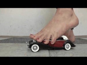 Model Car Under Pretty Naked Feet